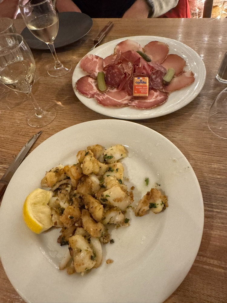 Plates of food on a restaurant table